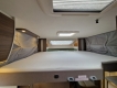 Etrusco-T6900-SB-camper-letto-basculante-sopra-dinette.jpg